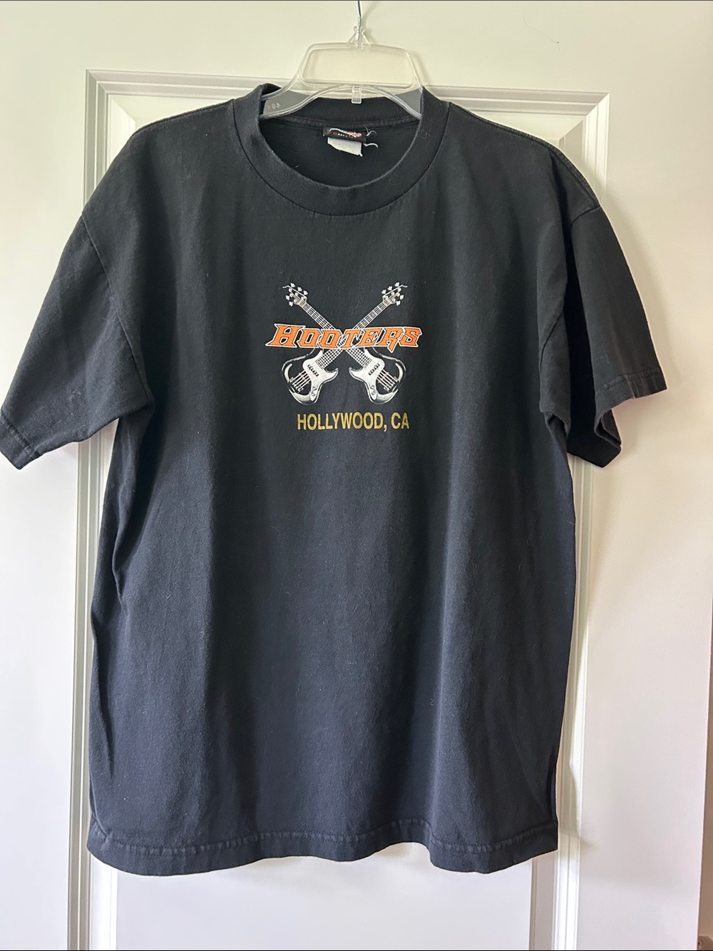 Fifth Sun Black Tee with Orange and Yellow Hooters Guitar Logo